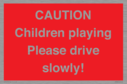 caution-children-playing-please-drive-slowly~